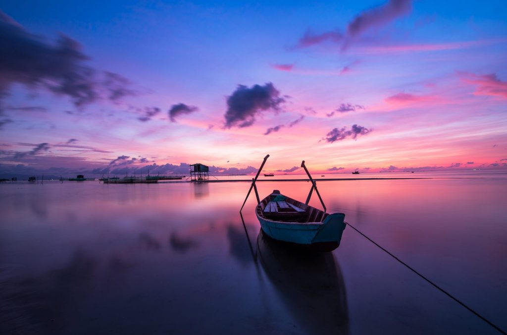 A boat in sunrise what's up dp image