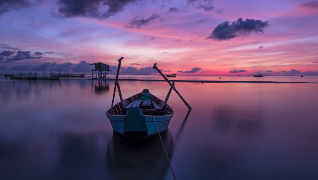 A boat in sunset whatsapp dp image