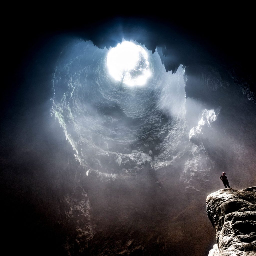 A man enjoy sunlight in the cave whatsapp dp image