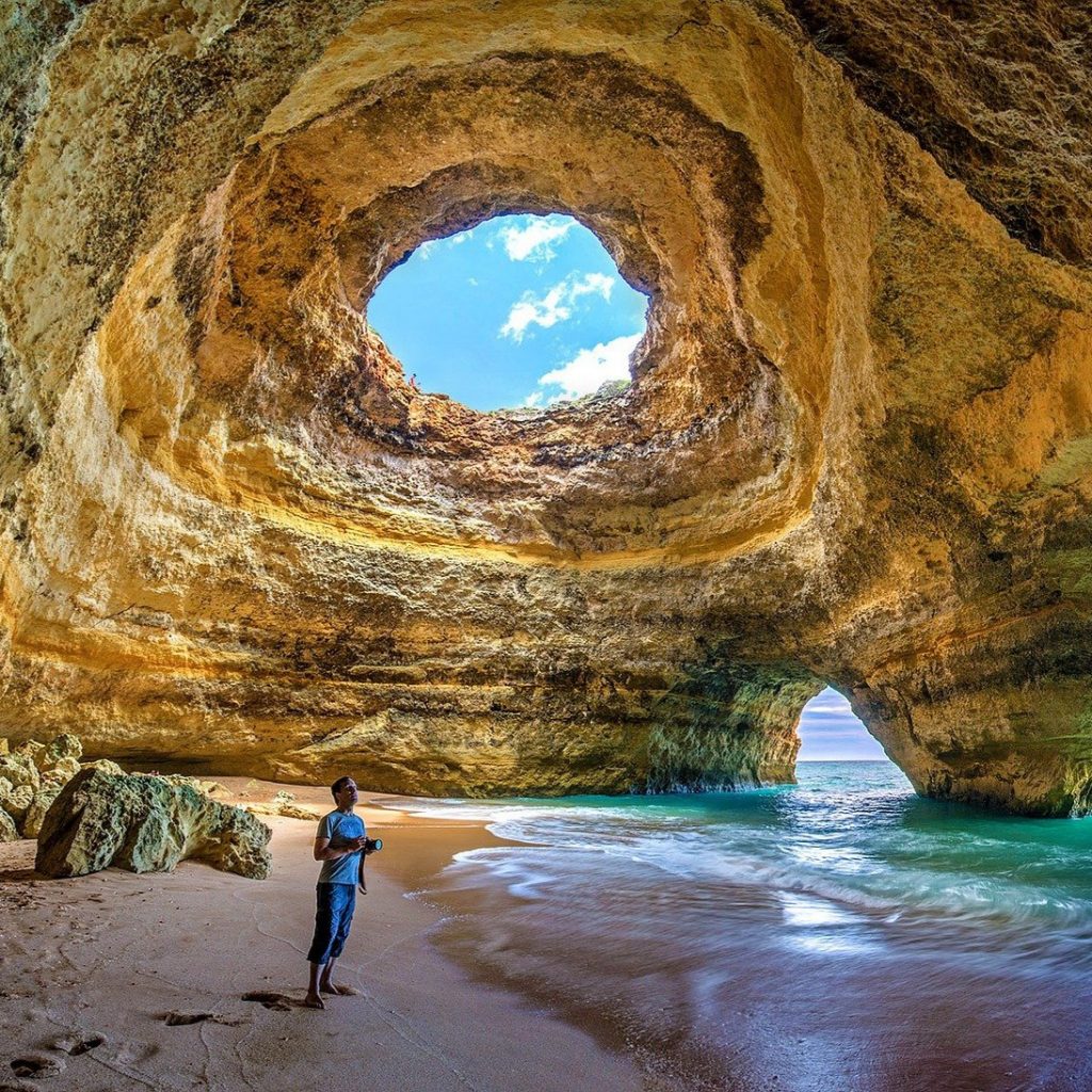 Golden cave with beach and enjoy peoples whatsapp dp image