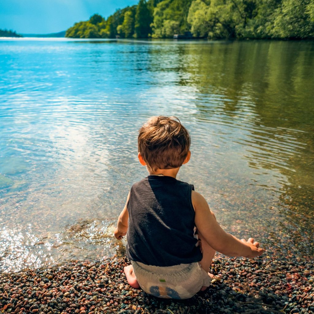 A Child Playing Lake Water In Summer Whatsapp Dp Image