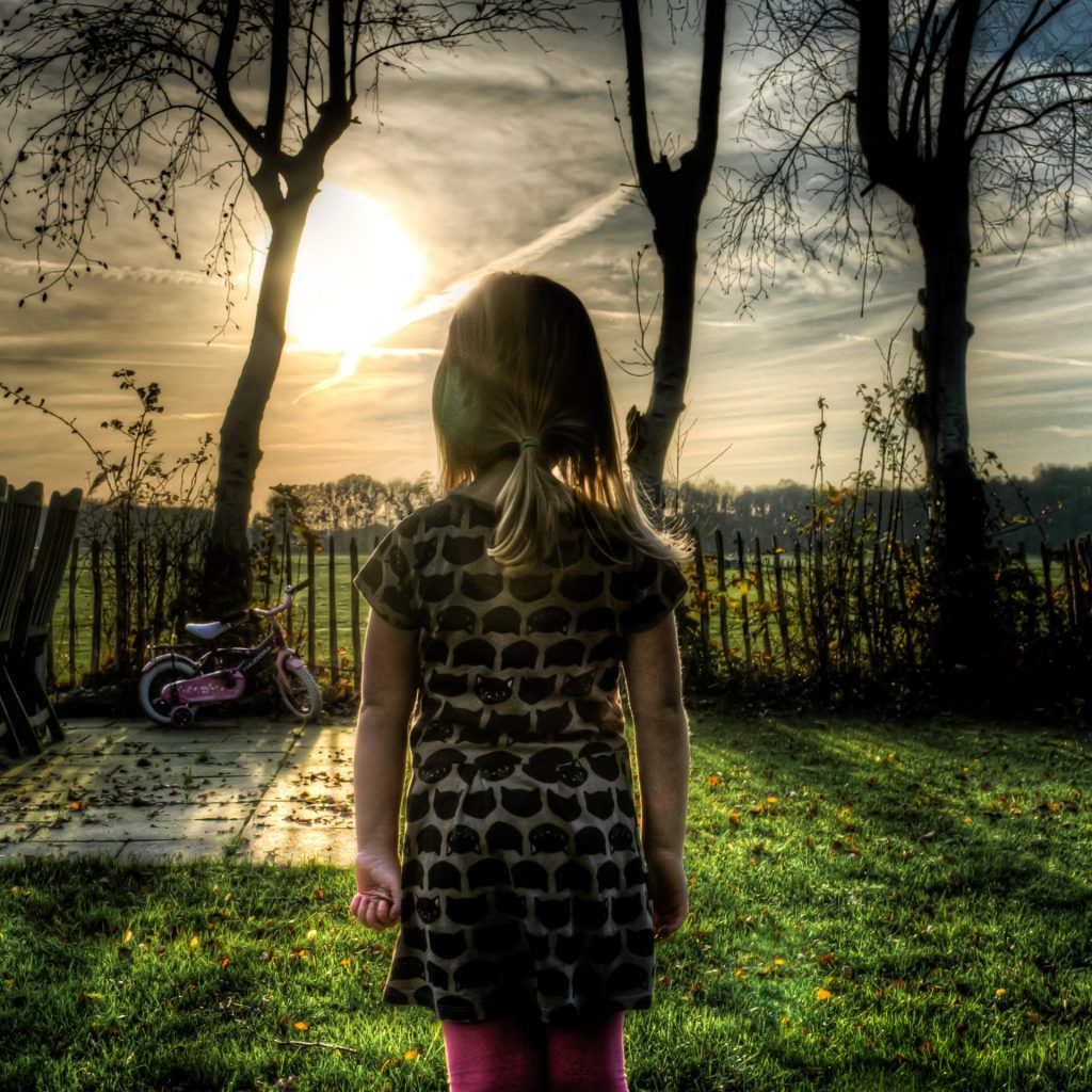 A Girl Enjoy Sunlight Standing In The Grass Field Whatsapp Dp Image