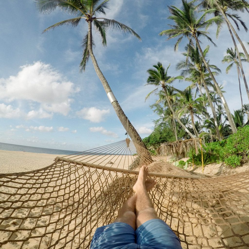A Man Enjoying Beach Sleeping On A Rope Bed Whatsapp Dp Image