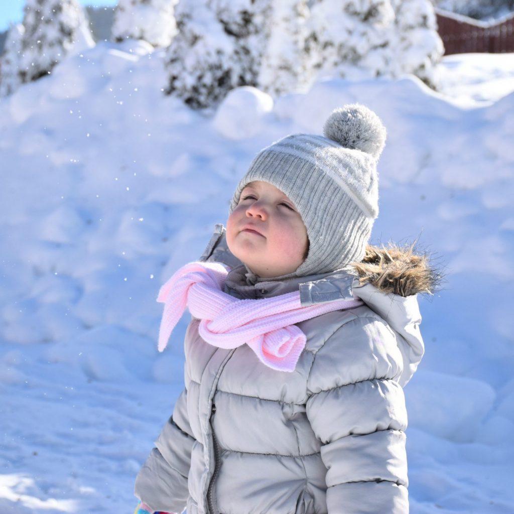 A child enjoy sunlight in winter season whatsapp dp image