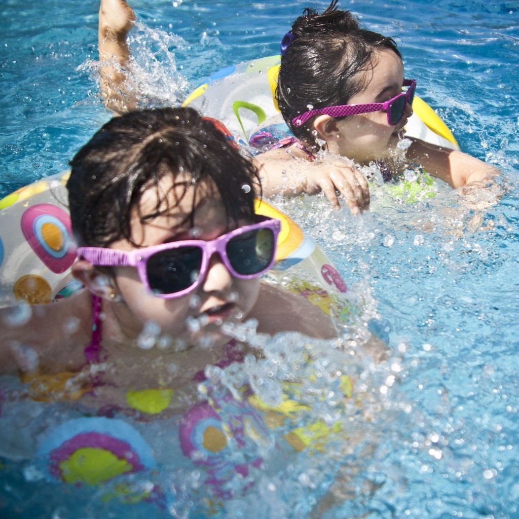 Two Girls Child Swimming In The Pool In Summer Whatsapp Dp Image