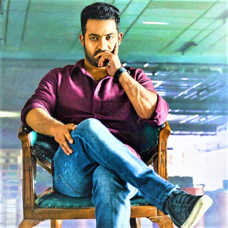 Jr NTR Seatig On Chair With Agrasive Look Whatsapp Dp Image