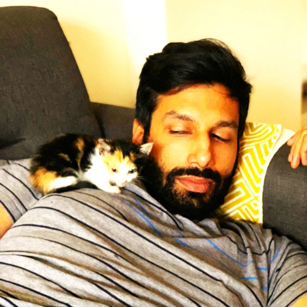 Kanan Gill Sleeping With His Pet WhatsApp DP Image
