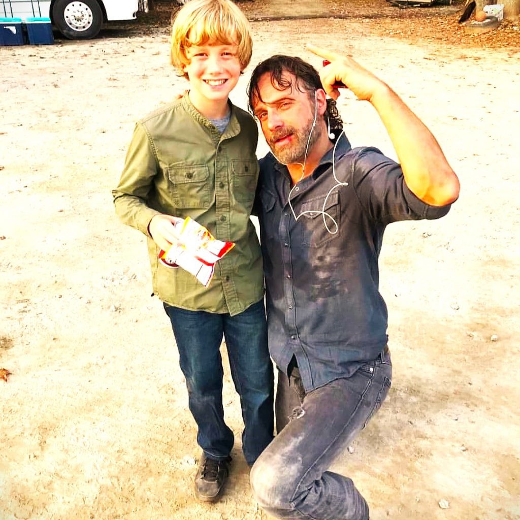 Andrew Lincoln Fun With A Child Boy In Shooting Set WhatsApp DP Image