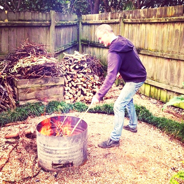 Christopher Chapman Making Fire In His Garden WhatsApp DP Image