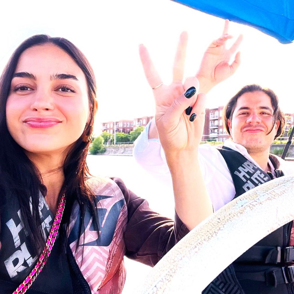 Melissa Barrera And His Boy Friend Paco Xavier Zazueta Enjoying Boat Riding WhatsApp DP Image