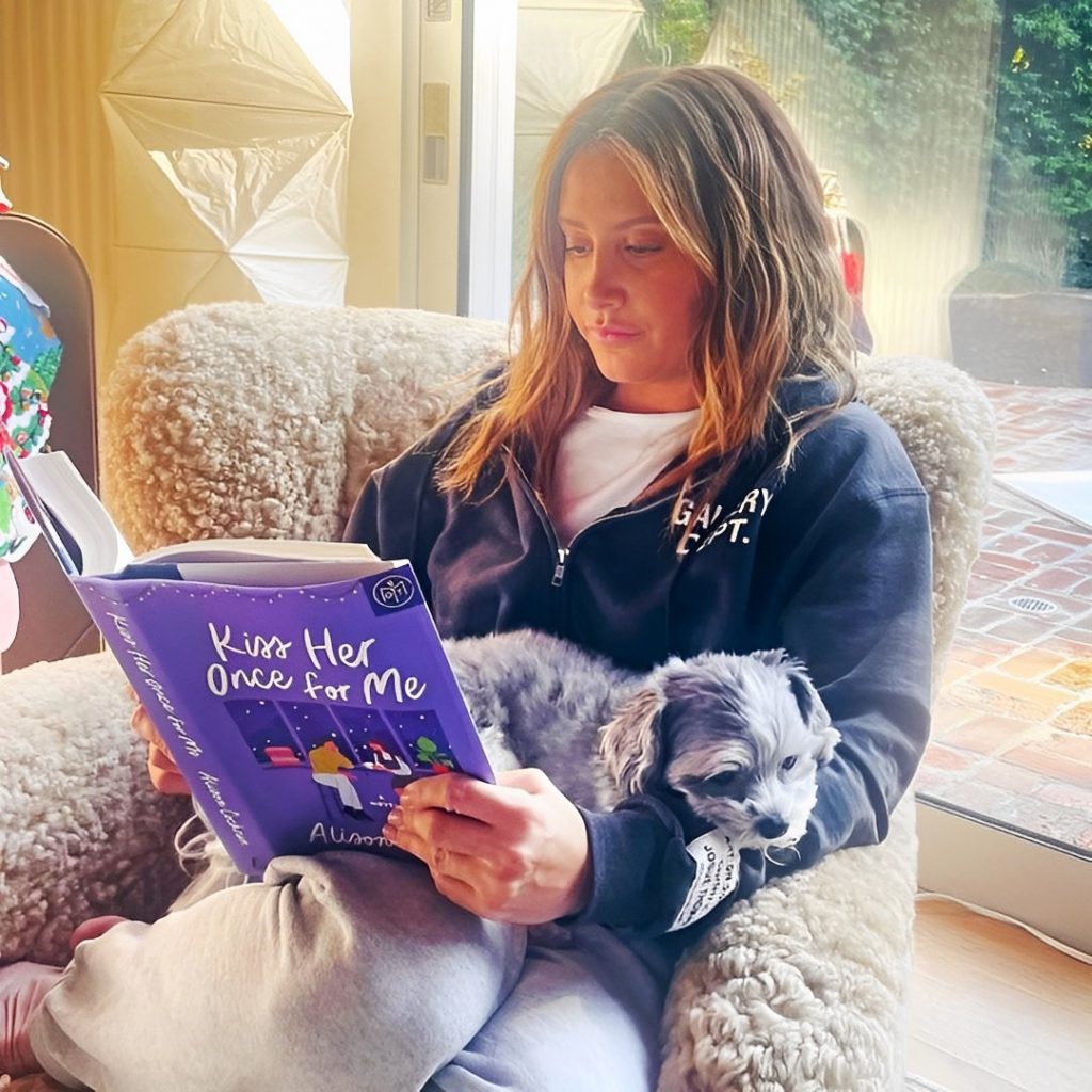 Ashley Tisdale Busy In Reading Book