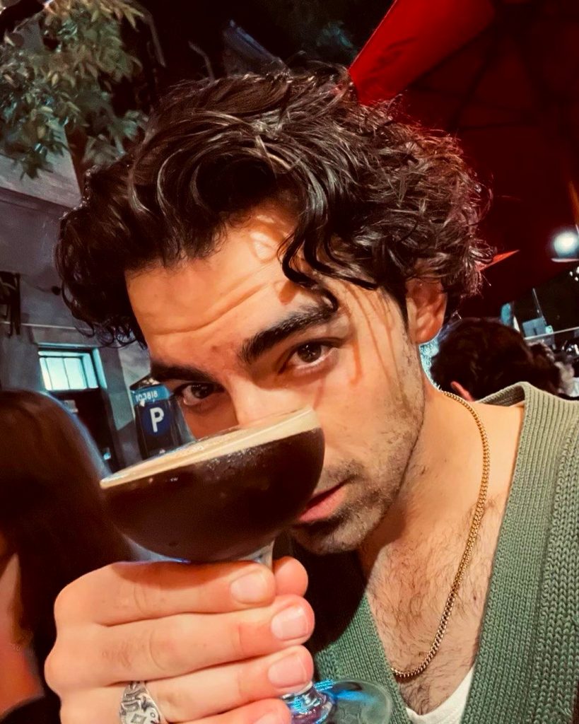 Joe Jonas Enjoying The Drink