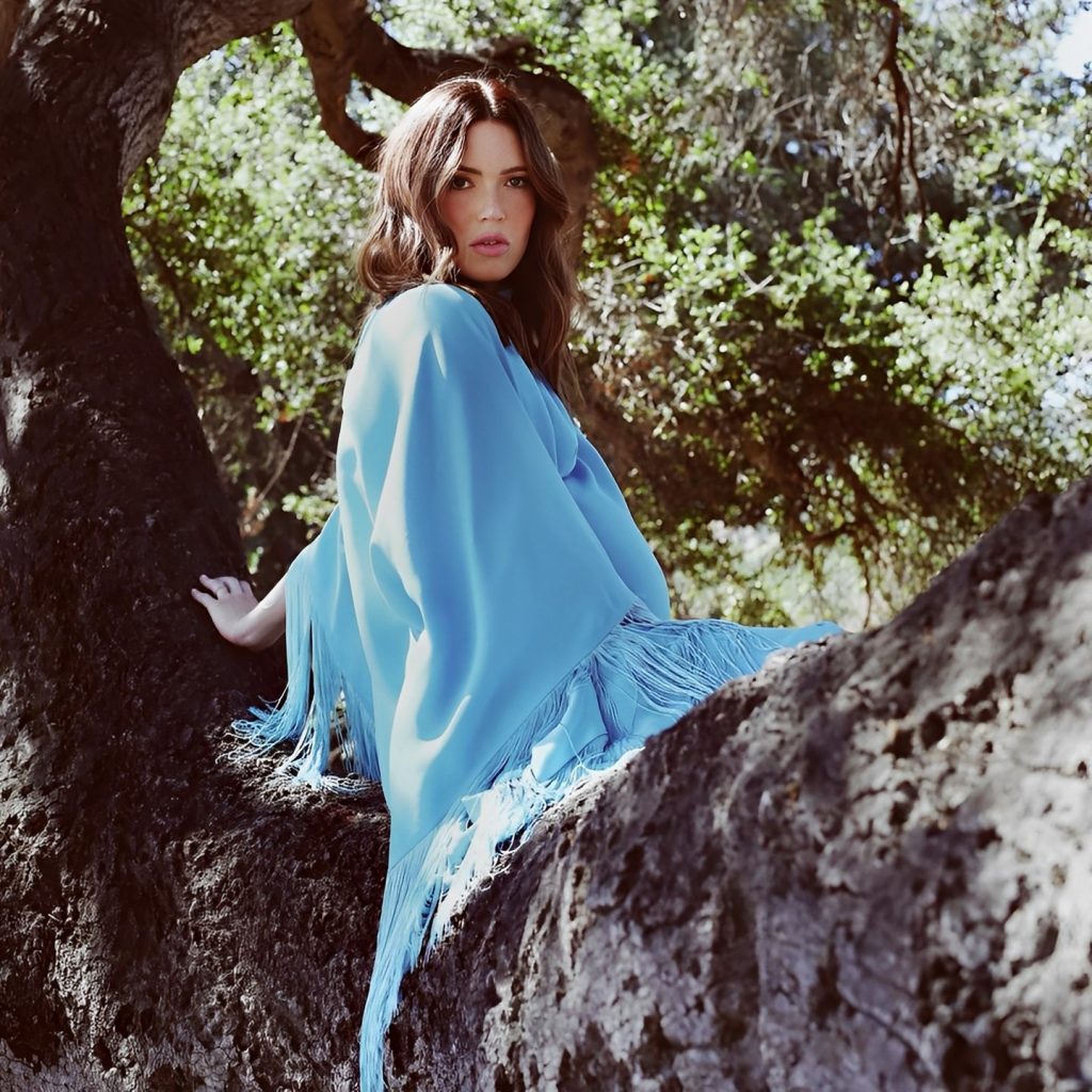 Mandy Moore Seating On A Tree
