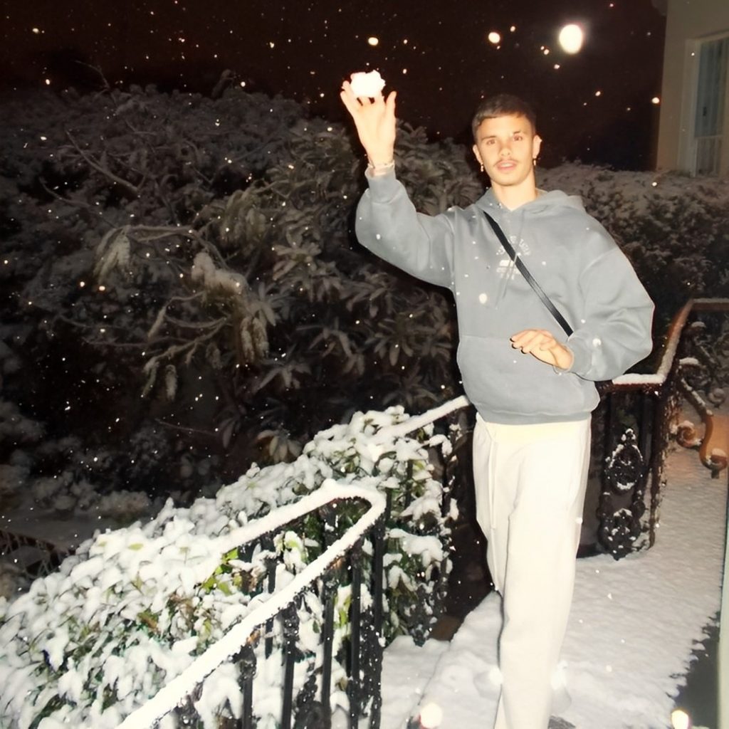 Romeo Beckham Enjoying With Snow Rain