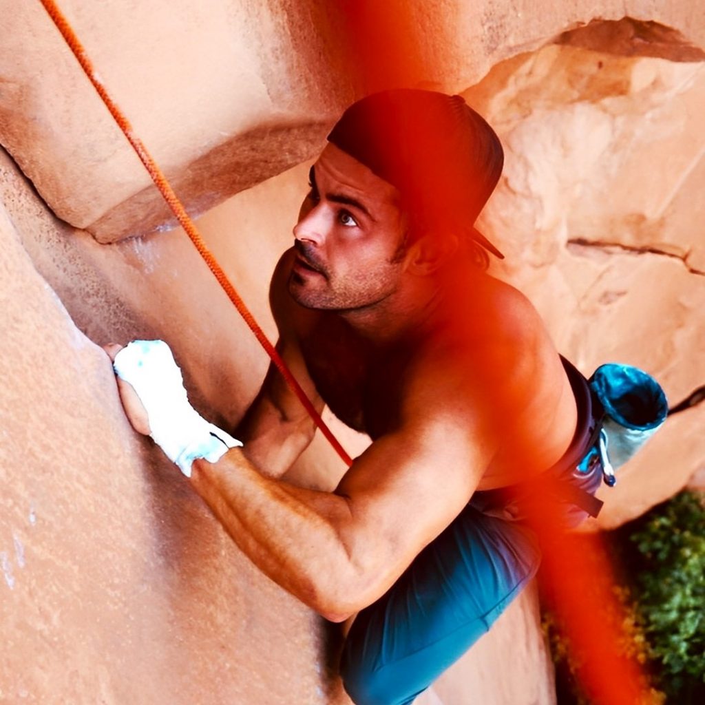 Zac Efron Climbing Hill
