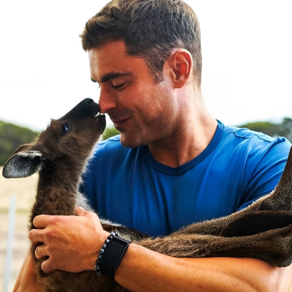Zac Efron Holding A Baby Kangaru